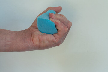 Sponge training after Dupuytren surgery during occupational therapy. Make a fist, and involve the...