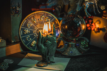 Rite with a burning candle, night mystery atmosphere, Christmas eve, Yule or another day