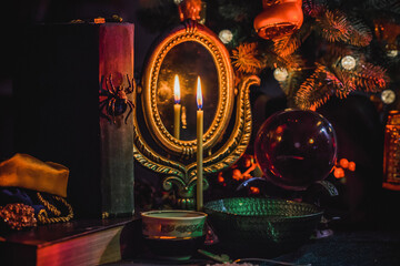Rite with a burning candle, night mystery atmosphere, Christmas eve, Yule or another day