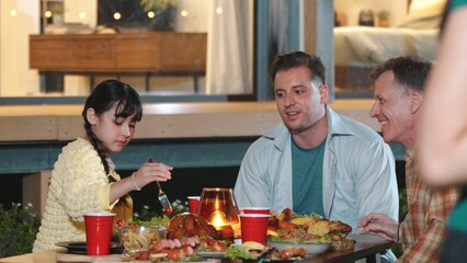 Family gather celebrate holiday. Parents, grandparents and girl together to talk and have dinner...