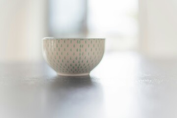 Cute patterned bowl sitting on countertop