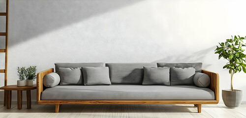 A modern living room with a wooden couch, minimalistic decor, and clean lines, providing a calming and stylish space.