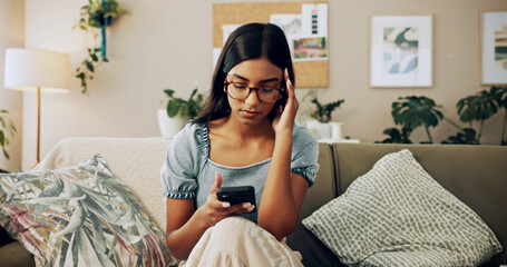 House, stress and woman with smartphone, headache and mistake with communication. Person, apartment and girl on couch, mobile user and cellphone with migraine, online reading and error message