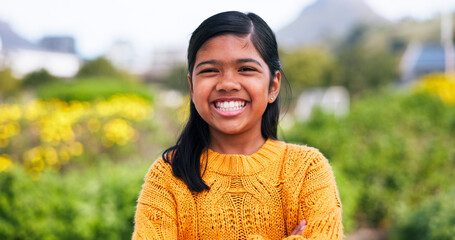 Portrait, smile and sustainability with Indian girl outdoor in garden for eco friendly fashion....