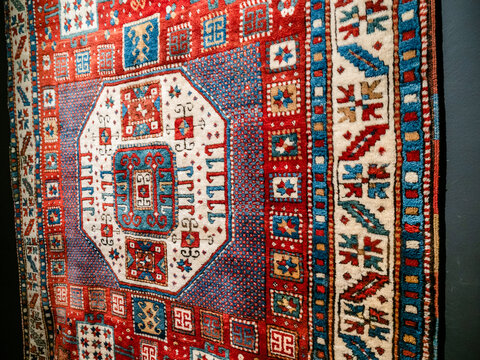 Yerevan, Armenia - December 1, 2024: surface of handcrafted local carpet from western armenian regions in History Museum of Armenia in Yerevan city