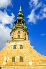 View of the 123m high pyramidal shape tower of St. Peter's Church in Riga, Latvia