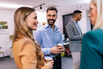 Business people on a coffee break during a seminar.