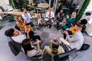 Group of multiracial business people on an group psychotherapy conference, seminar in their office...