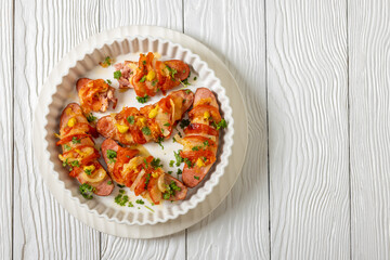 hot sausages baked with cheese, tomato, mustard