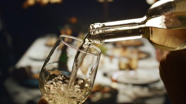 Pouring White Wine Into Glass Party Table Food Event Celebration Elegance Dining