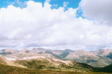 view of mountain range on cloudy day