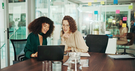 Business women, laptop and discussion with project planning for strategy, schedule or report at...