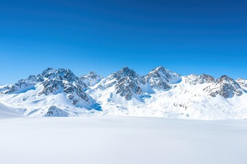 Majestic Snow-Covered Mountains Under a Clear Blue Sky