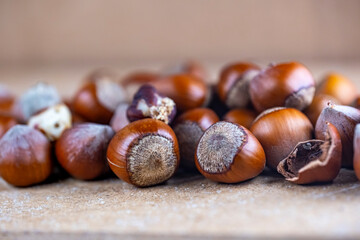 A pile of nuts, including almonds, walnuts, and hazelnuts
