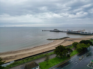 Fototapeta premium High Angle View of Most Beautiful and Attractive British Tourist Attraction British Beach and Ocean at Clacton on Sea City of England United Kingdom. Aerial Footage Was Captured on May 21st, 2024