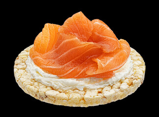 Puffed rice cake with salmon slices and cream cheese isolated on black background, package design element