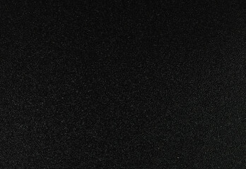 Fototapeta premium Background of plastic texture in black with small dots