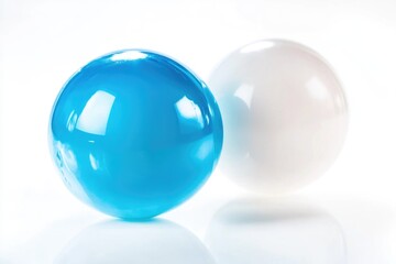 Two spheres of different colors sit side by side