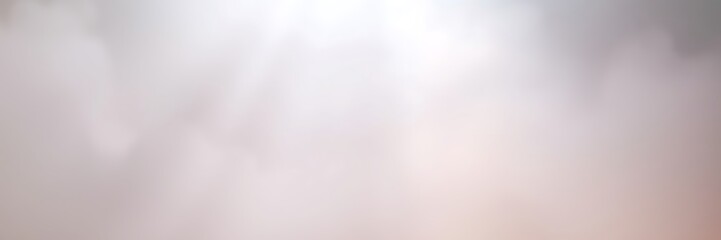 Soft pastel lighting beams through gentle fog creating soothing atmosphere, copy space