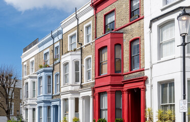Obraz premium Touristic route on Notting Hill, walking on streets with colourful houses, Portobello road, city life, wealthy neighbourhoods in London, UK