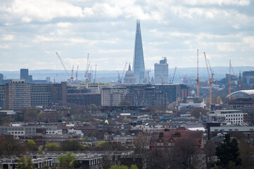 View of office buildings, skyscrapers and modern constructions from the viewpoint at Parliament hill in spring, North London, UK