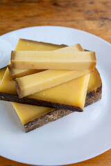 French aged in caves cheese Comte, made from unpasteurised cow milk Prestige,  Vieille Reserve close up