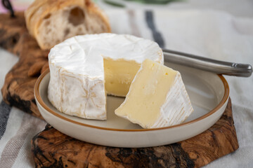 French soft Camembert cheese, original Camembert de Normandie made from raw cow milk