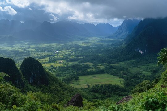 Sunbeam Over Phoufa Summit: Illuminating Hills and Mountains in Phongsaly, Laos