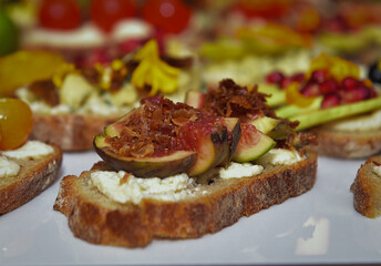 Brushetta, traditional Spanish tapas, Italian snacks, sweet bruschetta, bruschetta with fruit, loaf of bread