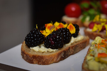 Brushetta, traditional Spanish tapas, Italian snacks, sweet bruschetta, bruschetta with fruit, loaf of bread