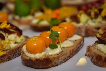  Brushetta,gourmet cape gooseberry and cream cheese bruschetta, sophisticated appetizer setup, fine dining experience, culinary delicacy
