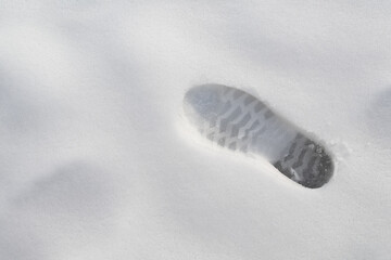 Shoe print in the snow.
