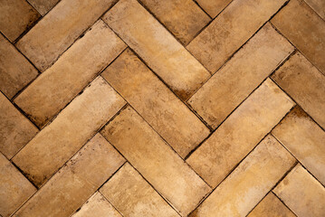 Brown herringbone brick floor background