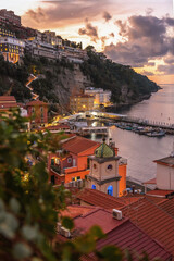 Fototapeta premium Italy, Sorrento. View from the high shore of the sea and the surrounding area of ​​Sorrento in the evening