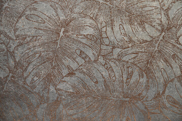 Textured plaster surface with leaf, background