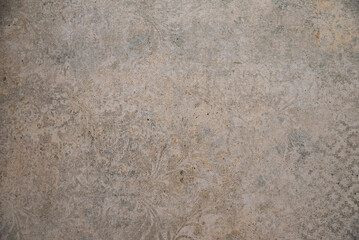 Decorative textured wall with intricate patterns in soft colors