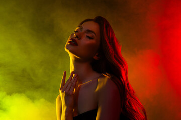 Photo of gorgeous pretty girl touch neck close eyes feel tenderness enjoying isolated mist neon color background