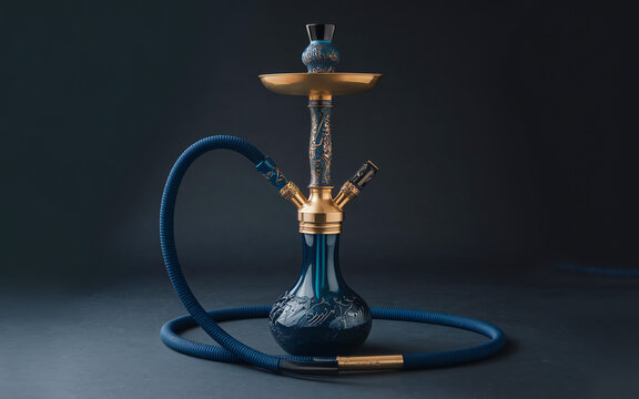 Elegant blue hookah with intricate design sitting on dark background
