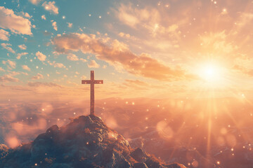 Fototapeta premium Cross on mountain at sunrise with golden sky and light flares