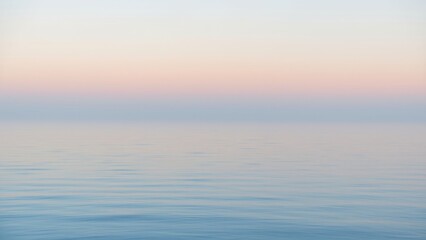 Obraz premium Serene Ocean Horizon at Twilight with Soft Pastel Colors