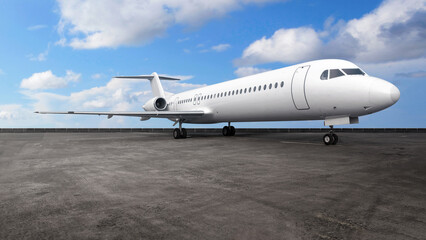 Commercial airplane on the runway with a blue sky background