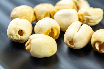 Closeup view of lotus seeds (Nelumbo nucifera) in the bowl