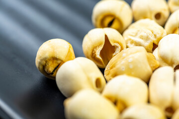Closeup view of lotus seeds (Nelumbo nucifera) in the bowl