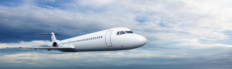 Commercial airplane flying in the sky with cloudscapes background