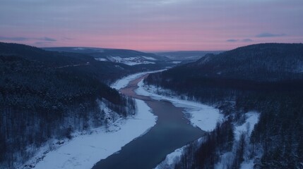 Fototapeta premium Serene Winter Sunset Over Frozen River Valley