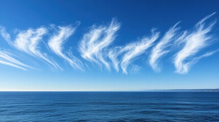 Obraz premium Serene Seascape with Cirrus Clouds