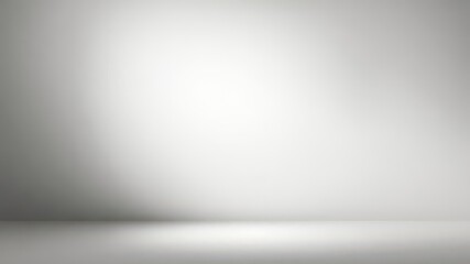 Gradient light in shades of gray emanating from a studio backdrop, creating a soft and elegant background, design