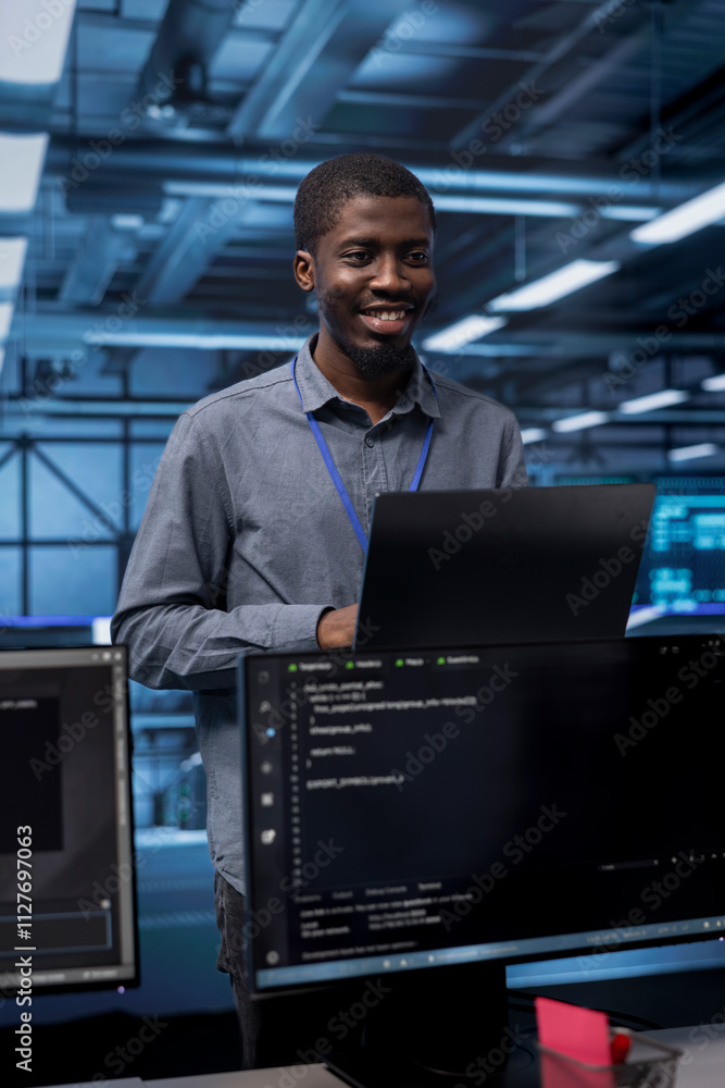 Aufkleber smiling engineer pleased by recovery plan, monitoring data center energy consumption. happy african 