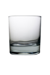 Clear glass tumbler rests elegantly on a reflective surface under soft lighting