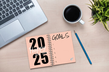2025 Happy New Year Resolution Goal List and Plans Setting - Business office desk with notebook written about plan listing of new year goals and resolutions setting. Change and elation concept.